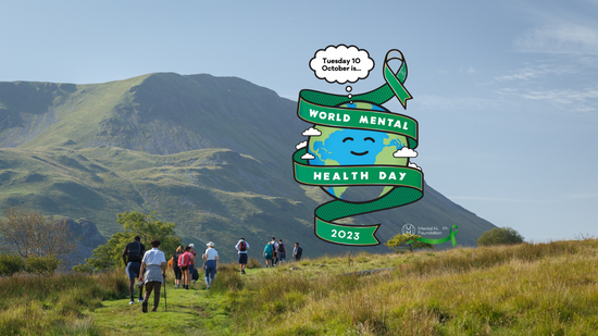 World mental health day logo over hiking image Mind Over Mountains 