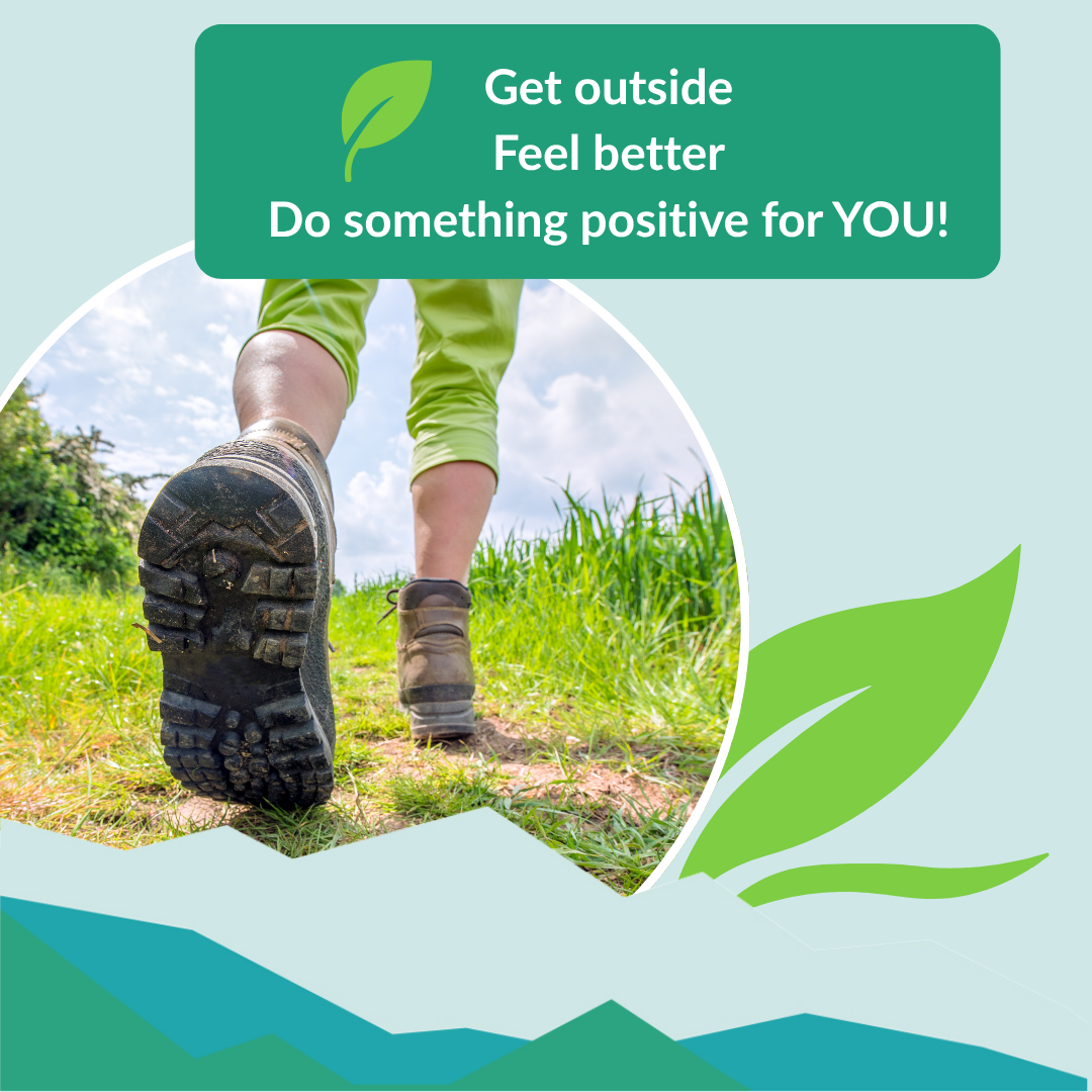 Person walking outdoors with hiking boots on grass, promoting positive self-care with text overlay.