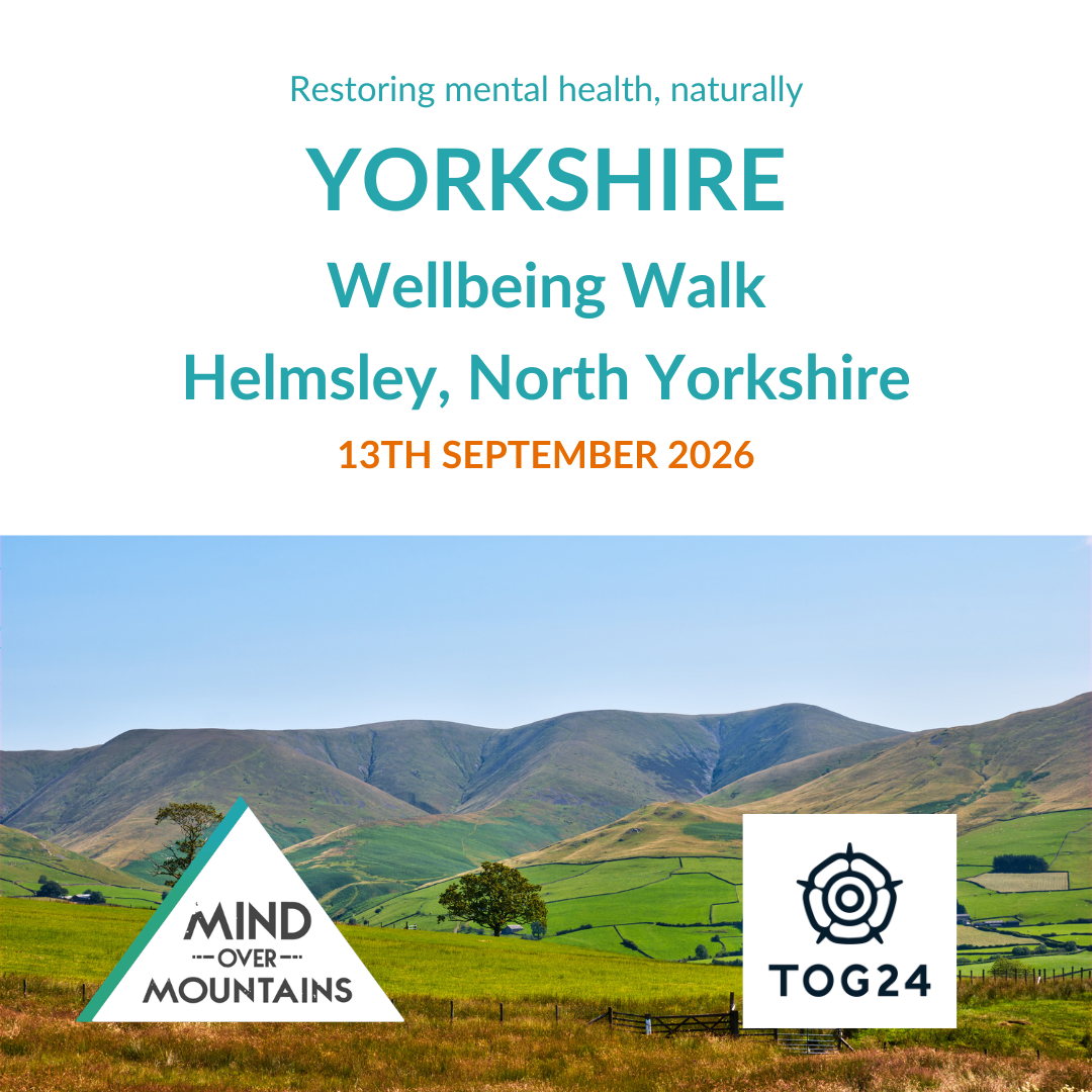 Promotional graphic for the Yorkshire Wellbeing Walk on 13th September 2026, featuring a scenic photograph of green rolling hills under a blue sky, with the Mind Over Mountains logo and TOG24 logo at the bottom.
