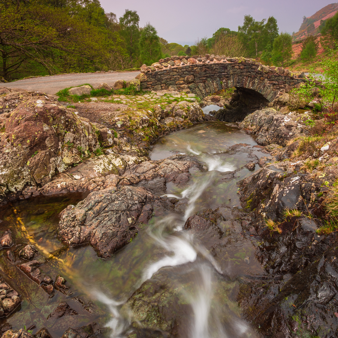 river and stone bridge at Keswick Lake District with Mind Over Mountains charity 