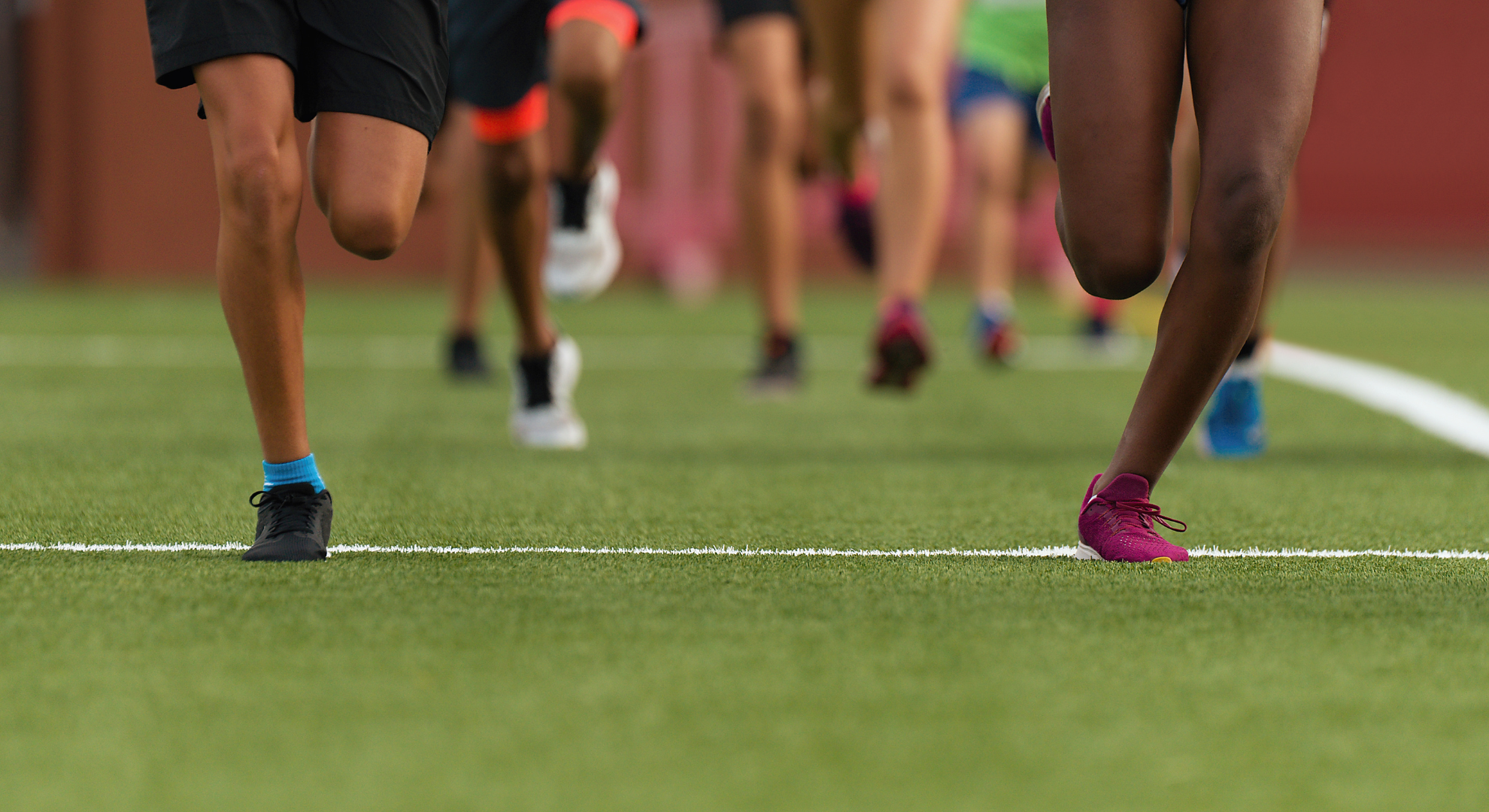 legs at start line of running race to raise funds for mental health charity Mind Over Mountains